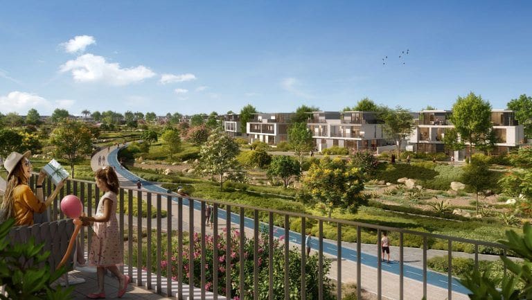 the valley by emaar cycling track among greenery and villas