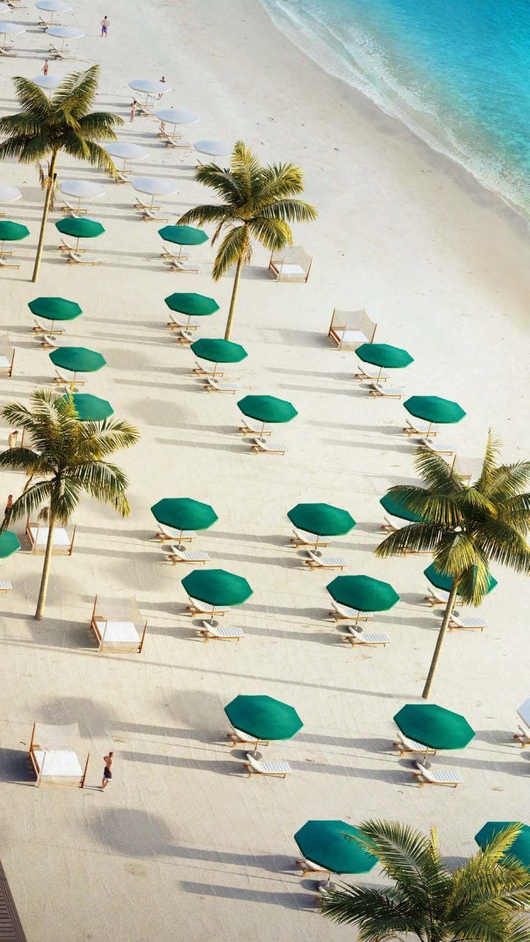 view of beach umbrellas on a sandy beach