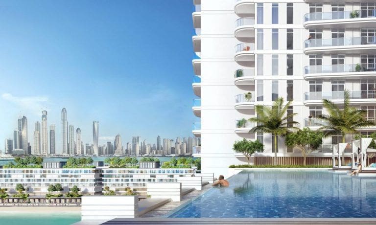 building with dubai marina skyscrapers in the background