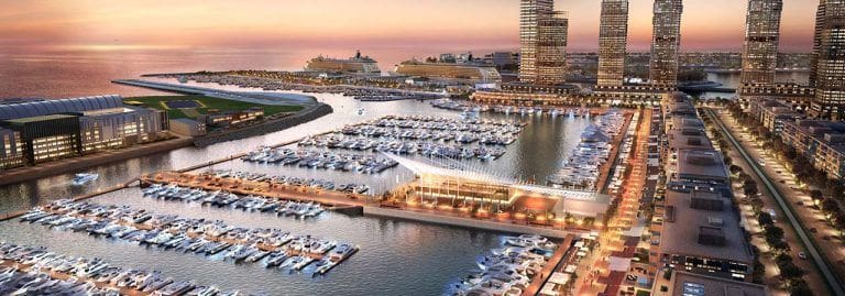 aerial view of a marina with parked yachts at sunset