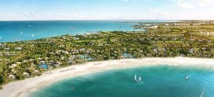 aerial side view of dubai islands hwoing lush green landscape