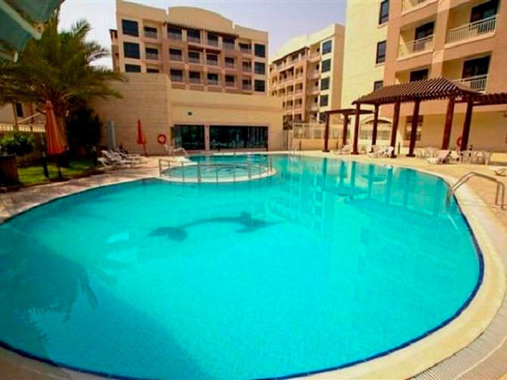 Dunes Village by Manazel Real Estate in Dubai Investments Park, Dubai