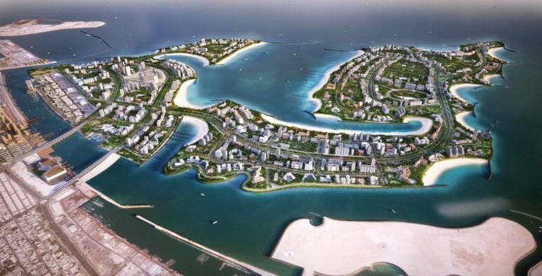 aerial view of dubai islands showing buildings and greenery