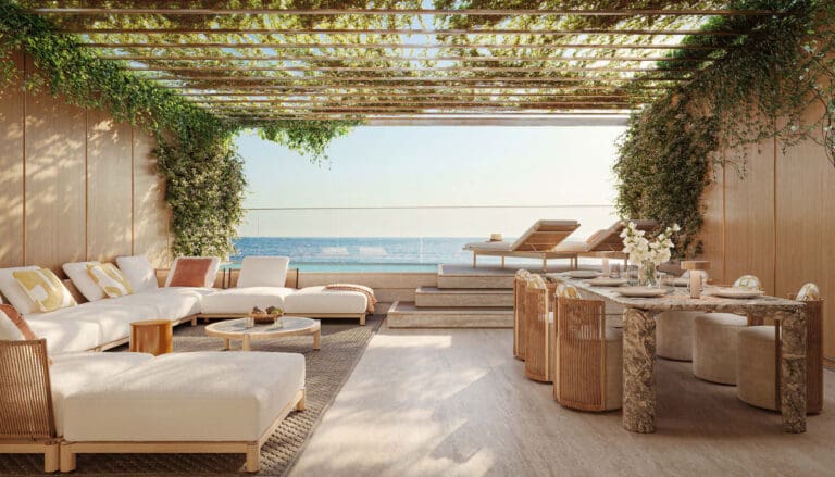 orise by beyond outdoor seating with dining table and sea view