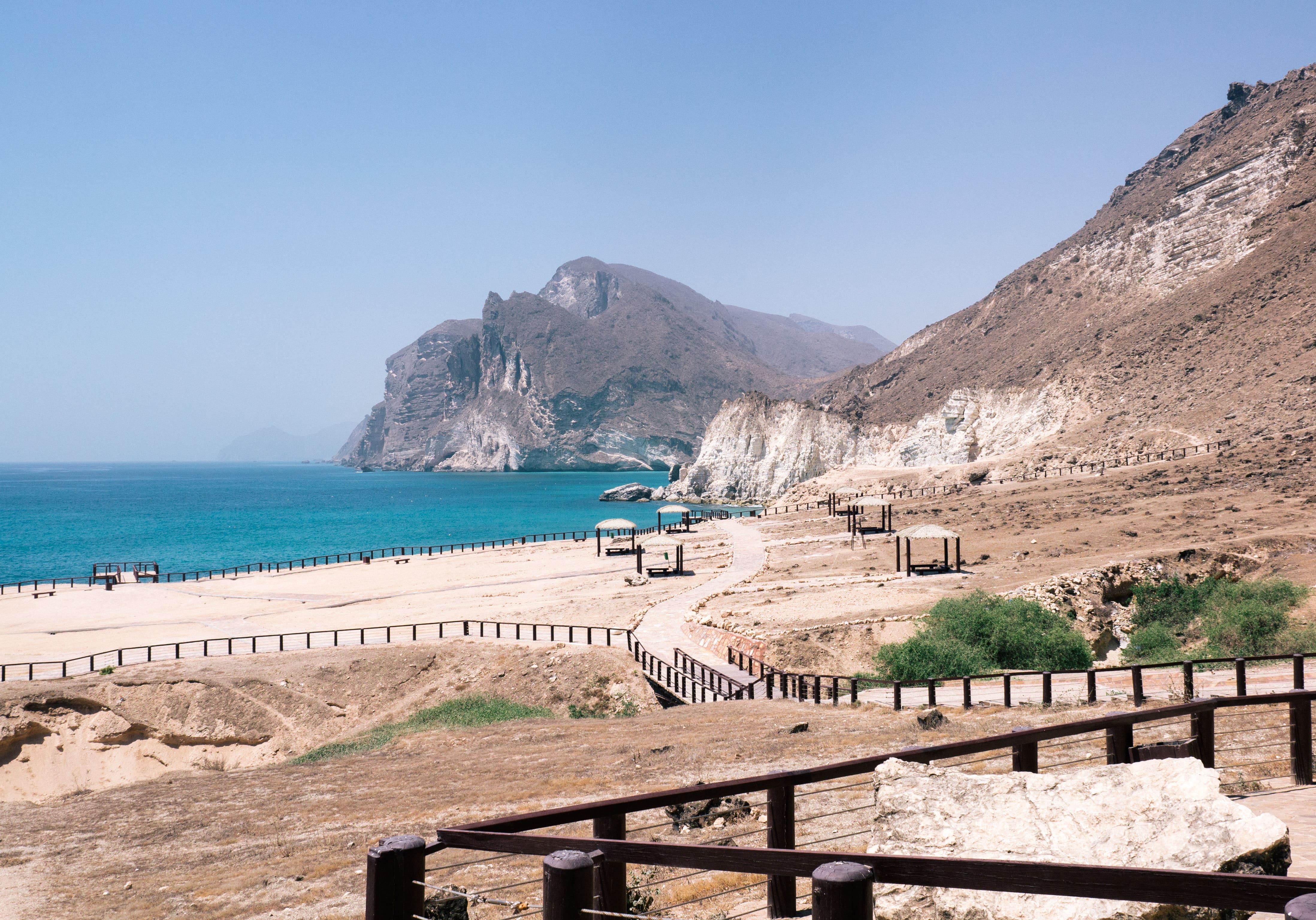 Mughsail Beach, Salalah, Oman — dramatic cliffs and turquoise shoreline