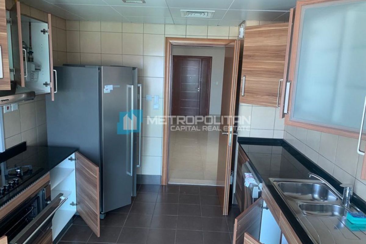 Penthouse in Beach Tower | Maids Room | Canal View