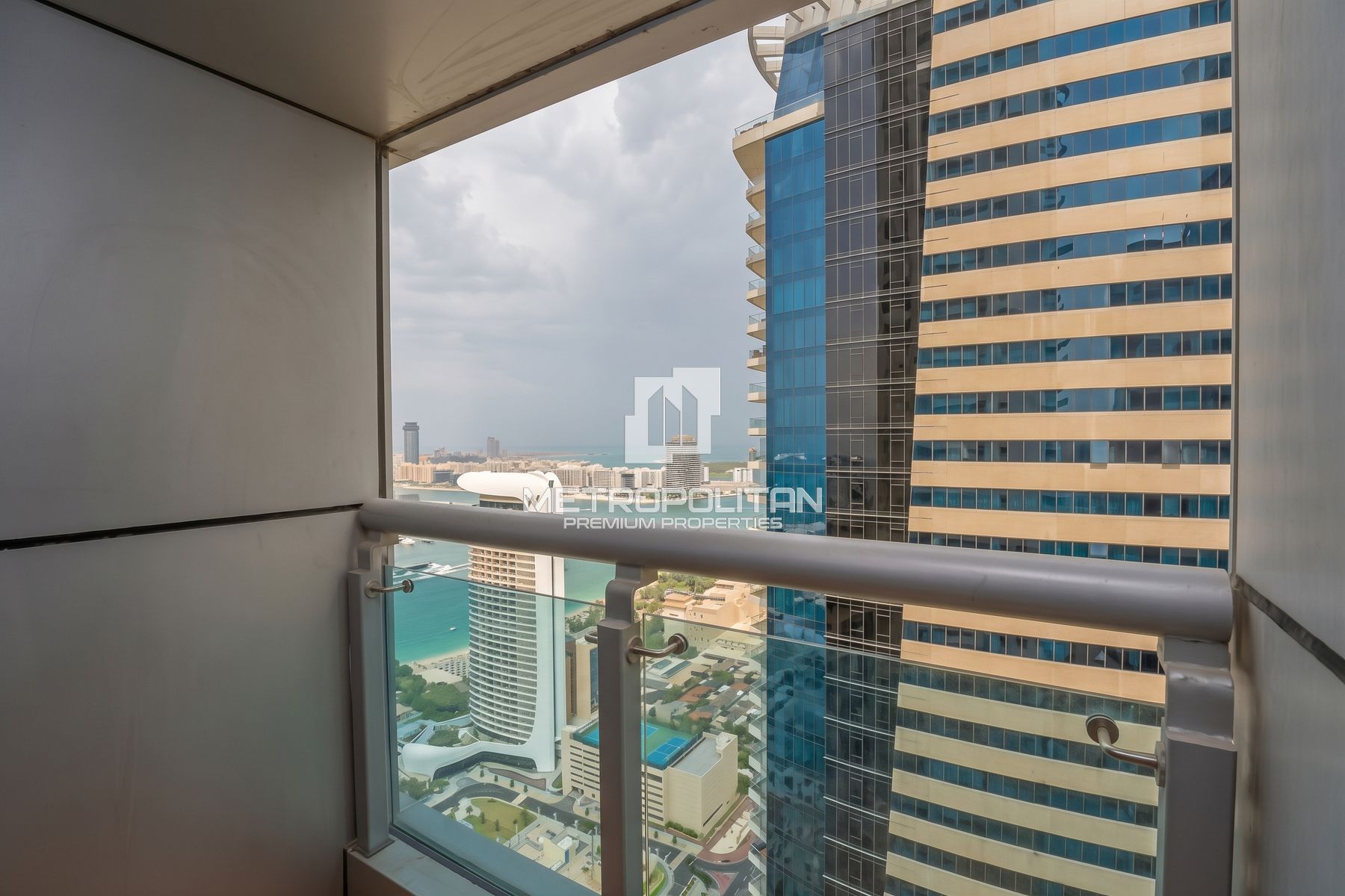 Mid-Floor | Multiple Cheques | Partial Palm View