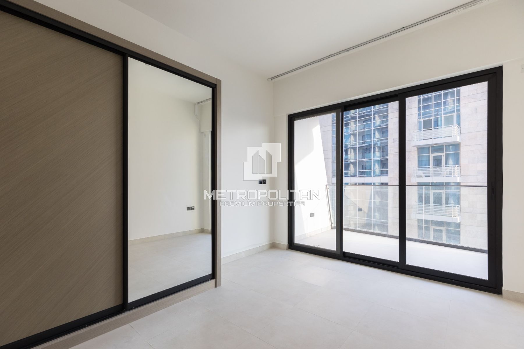 Waterfront 2BR + Private Terrace | Prime Location