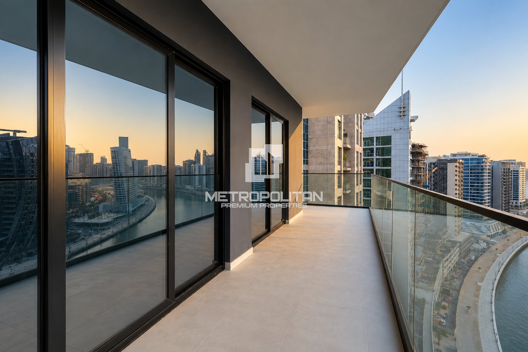 Waterfront 2BR + Private Terrace | Prime Location