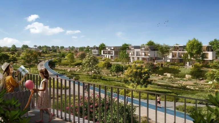 the valley by emaar cycling track among greenery and villas