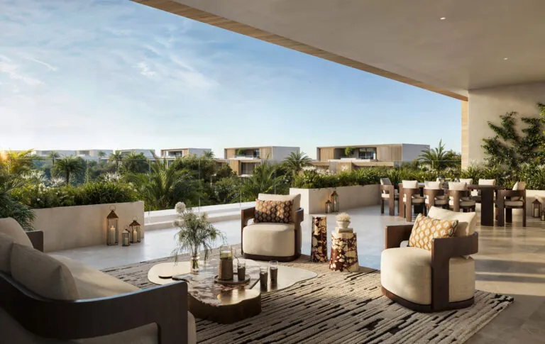balcony sitting area and dining room in lavita mansion in the oasis by emaar