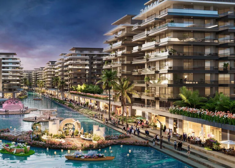damac riverside views apartment buildings overlooking the river with restaurants