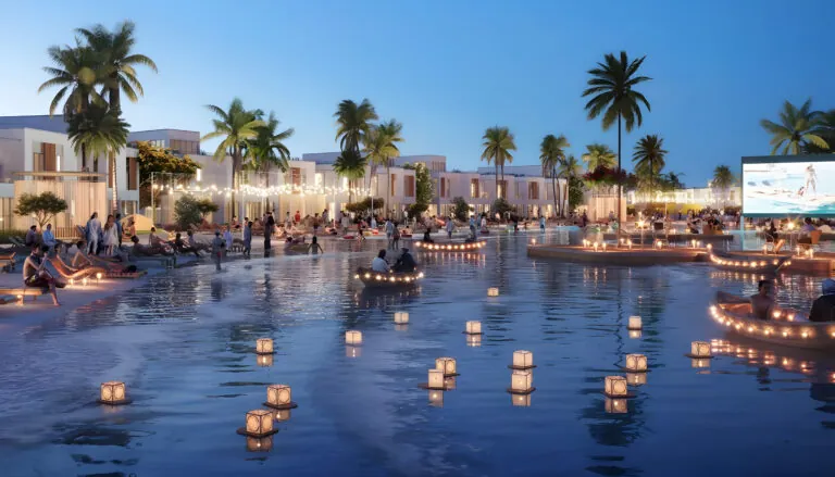 renderings of boats in the river with people all around surrounded by damac riverside townhouses
