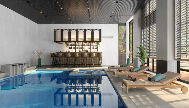 indoor swimming pool with bar at burj azizi